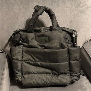 Itzy Ritzy Black Baby Bag with Durable Quilted Fabric and Padded Shoulder Strap